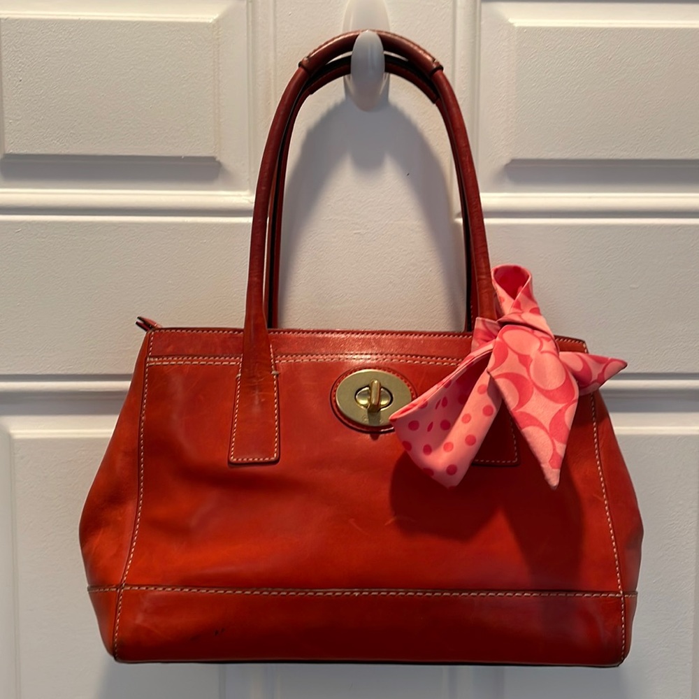 Red coach leather satchel with ribbon